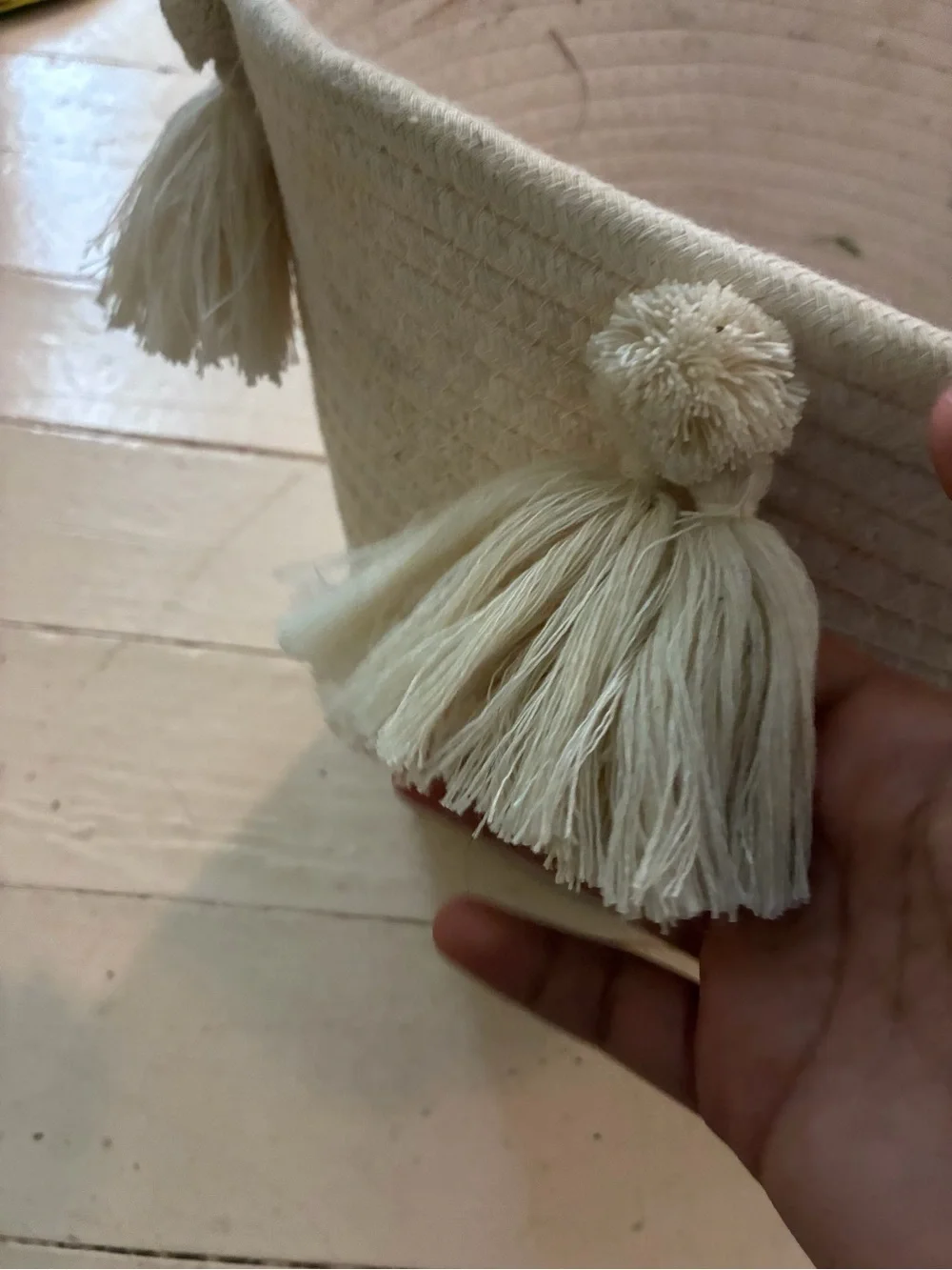 None pom tassel